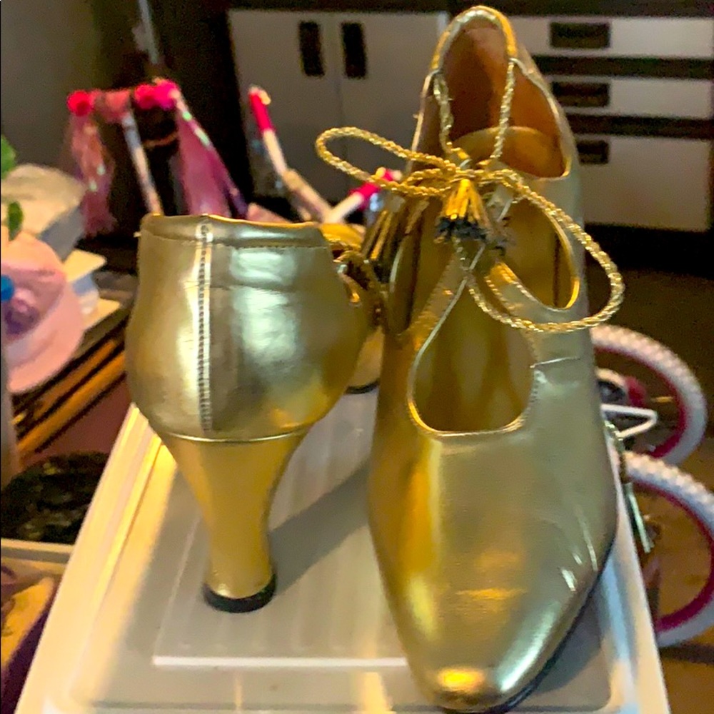 Gold high heels
